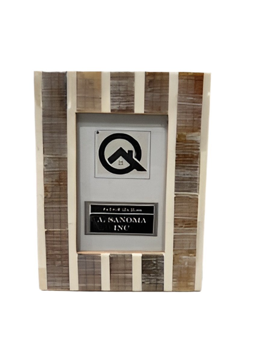A Sanoma Bone Horn Carving Frame 4x6